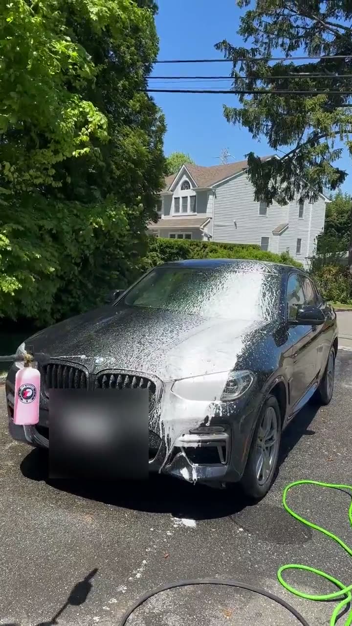 Car detailing — exterior wash in progress